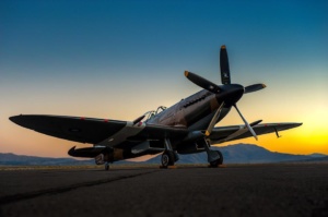 Supermarine Spitfire Mark 14 parked on the ramp at sunset.