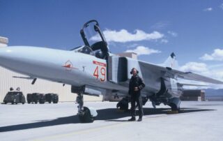 Rob Zettel next to a MiG 23MS
